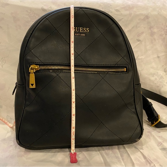 Classic and beautiful Guess backpack-style purse. - Picture 2 of 4